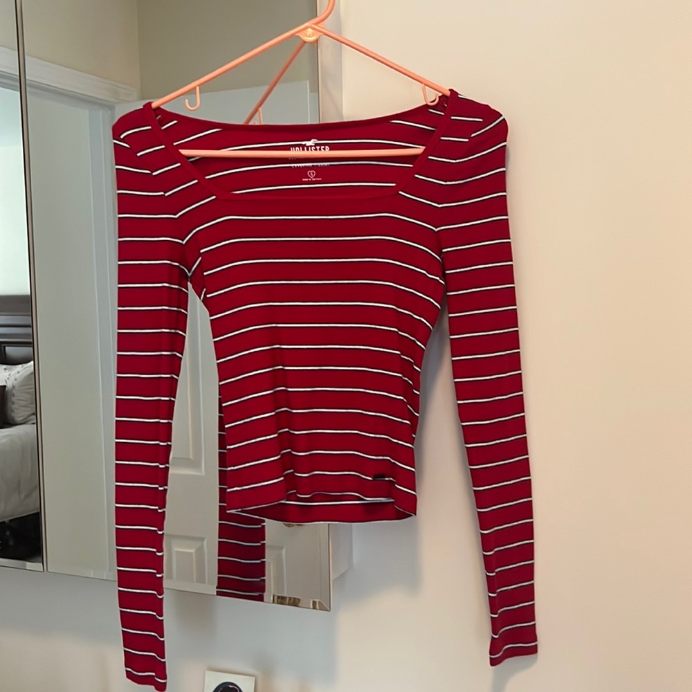 Red with thin white and black stripes from Hollister. Size small.